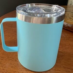 Light blue travel mug with lid